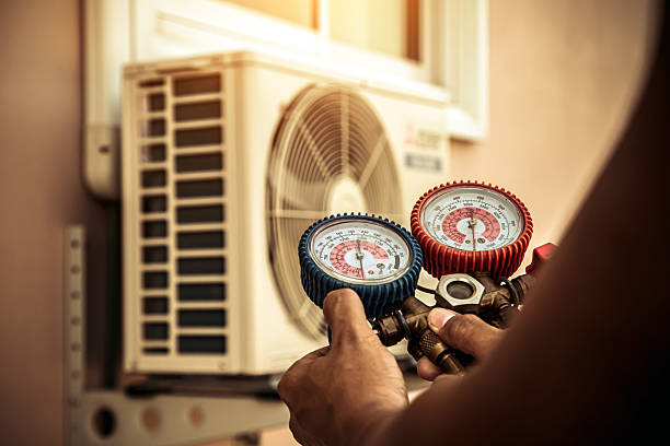 Professional Ac Installation technician working in Wales Center, NY